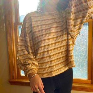 Striped white and orange sweater